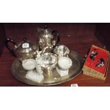 Four piece plated teaset, a pair of small Parian ornaments,