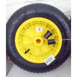 A new wheelbarrow wheel with pneumatic tyres and two spacers