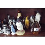 A large collection of assorted Penguin ornaments
