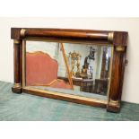 A Victorian over mantle mirror in gilt and rosewood frame 17" x 30"