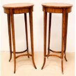 A pair of early 20th century oval satinwood lamp tables or plant stands approx 12" x 10"