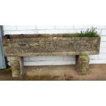 A reconstituted stone garden trough shaped planter approx 3'6 long