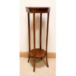 An Edwardian octagonal inlaid mahogany two tier plant pedestal