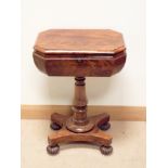 A Victorian mahogany tea poy on a pillar and platform base 21" x 15" and 29" tall