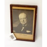 A small framed photograph of Sir Winston Churchill signed and dated June 8th 1942,