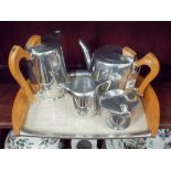 A Picquot four piece tea set with matching tray