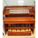 A 'Wyvern made in England' church organ with all the foot pedals,