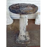 A reconstituted stone garden bird bath on column base,