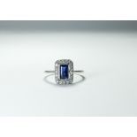 A 1930s art deco synthetic sapphire and diamond rectangular panel cluster ring.