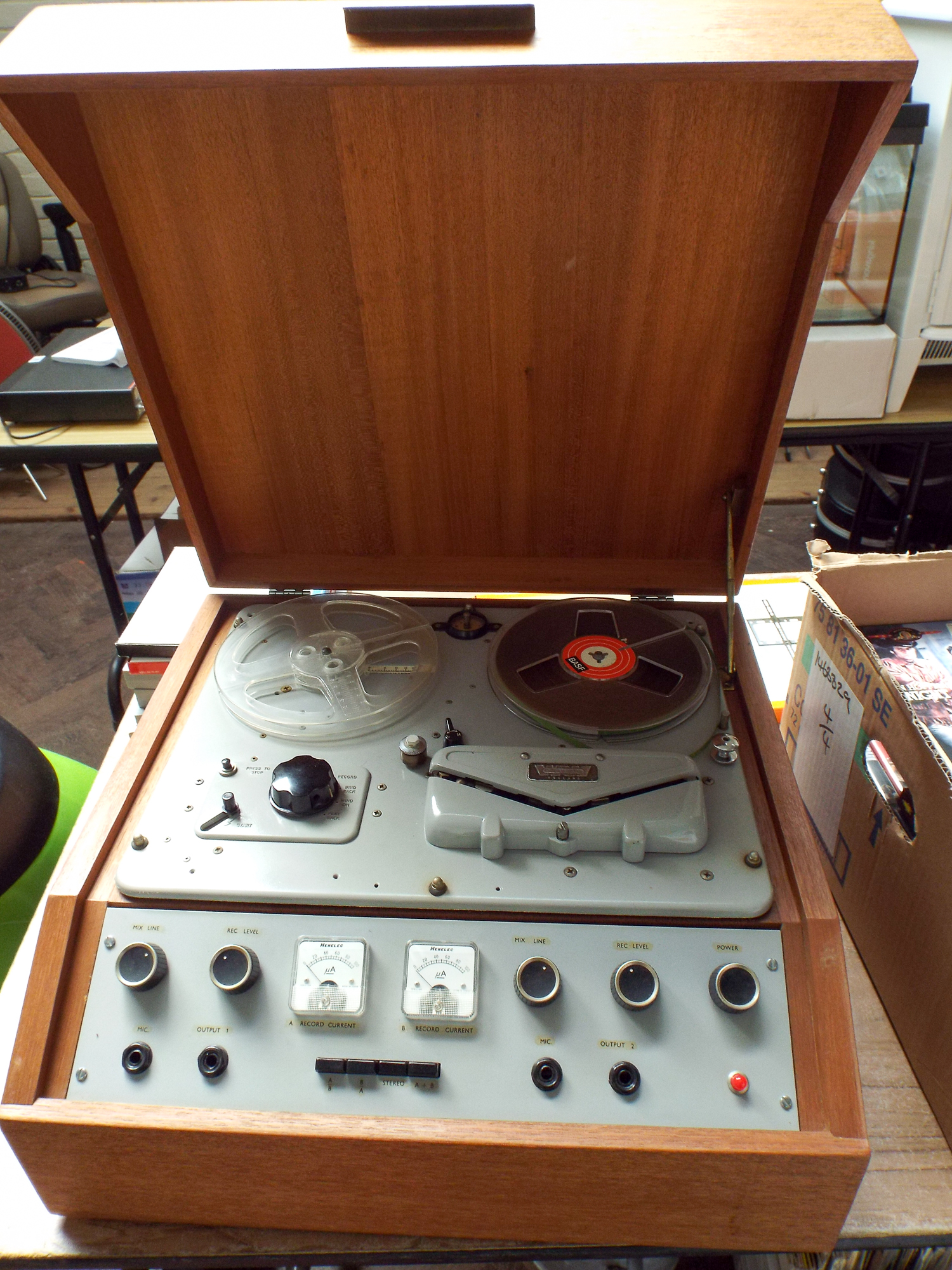 A Wearite large reel to reel tape machine in teak cabinet with some tapes