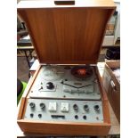 A Wearite large reel to reel tape machine in teak cabinet with some tapes