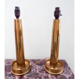 A pair of early 20th Century trench art brass electric table lamps made from shell cases,