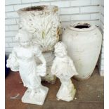 A reconstituted stone 34" high garden planter on concrete base,