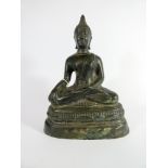 A hollow bronze seated Thai Buddha height 22cm