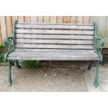 A metal ended wood based garden bench