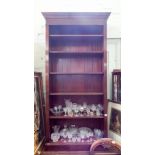 A tall mahogany open bookcase 2'6 wide