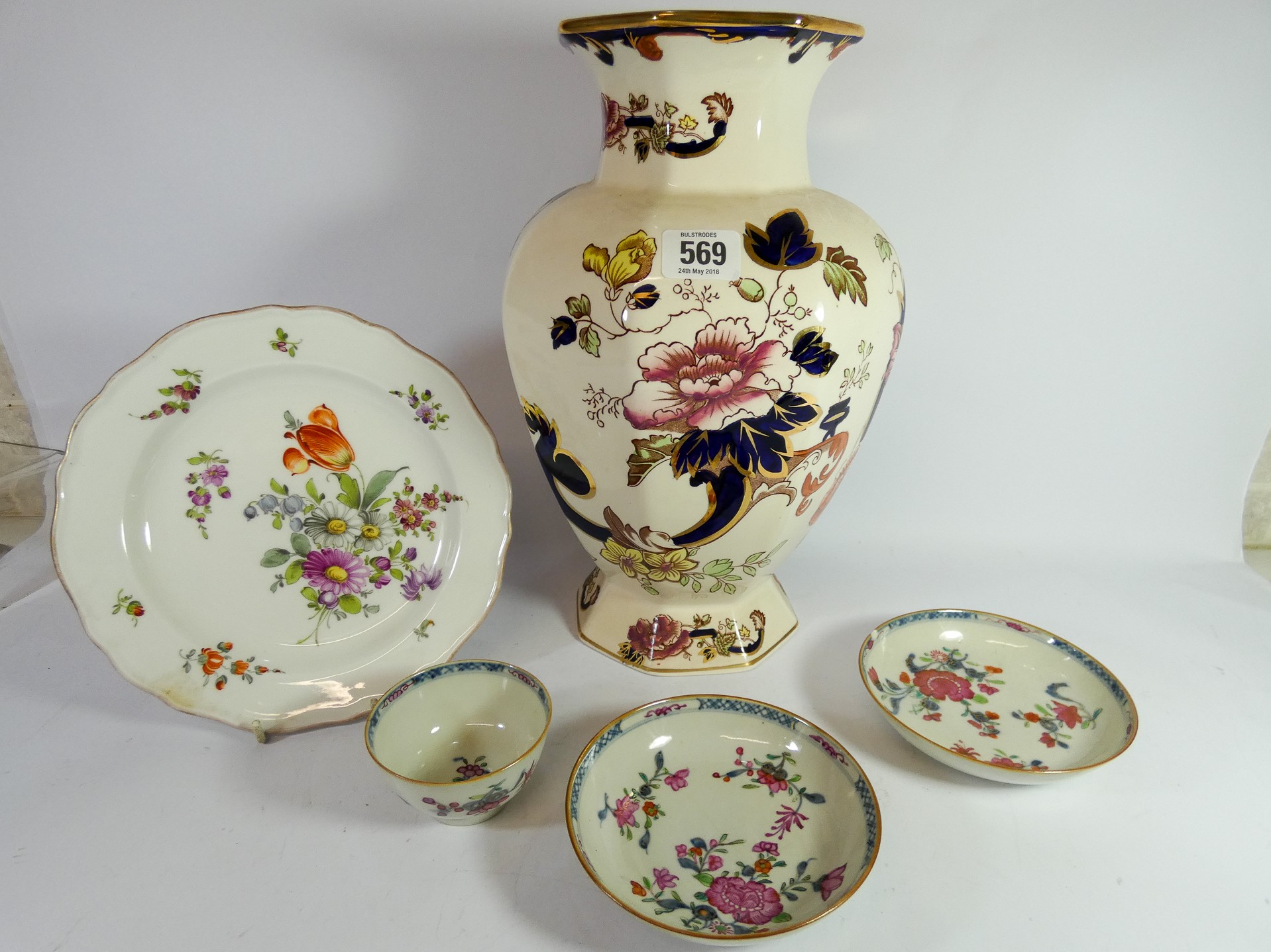A Dresden cabinet plate painted with flowers, oriental tea bowls,