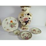 A Dresden cabinet plate painted with flowers, oriental tea bowls,