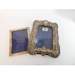 Two hallmarked silver photograph frames.