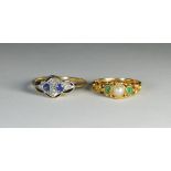 An antique emerald and split pearl ring and an Edwardian 18ct and platinum mounted sapphire and