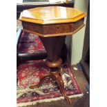 A Victorian octagonal walnut work box tripod base