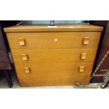 A teak chest of three long drawers 2'9 wide