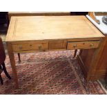 A Victorian stripped pale mahogany writing table fitted with two drawers,