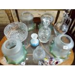 Two glass decanters, fruit bowl, four glass light shades,