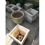 Three pairs of concrete garden pots and one off green glazed pot