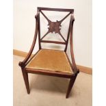 An Edwardian inlaid mahogany elbow style chair gold upholstered seat