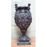 A classical bronze urn or vase, the handles as a pair of lady figures,