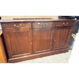 A reproduction mahogany sideboard fitted with three draws and cupboards,