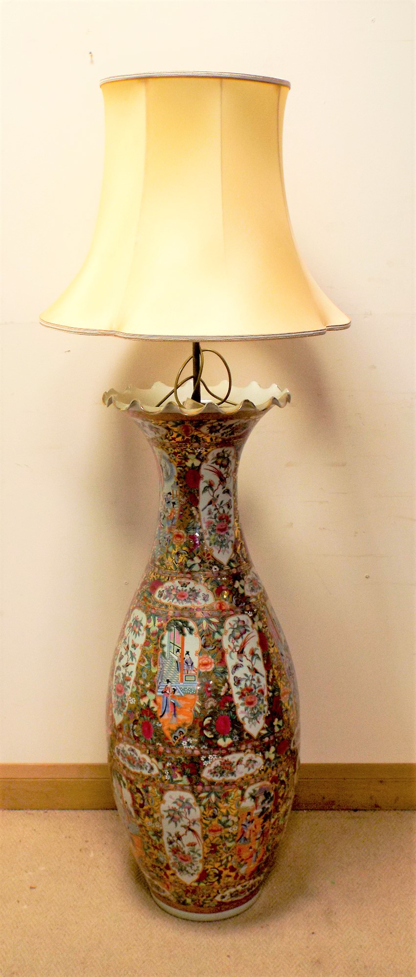 A large Chinese Famille rose vase converted to electricity with brass electric light fitting to the