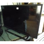 A Toshiba 32" digital LCD TV with freeview etc