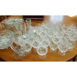 A quantity of assorted cut and other wine glasses, brandy balloons, fruit bowl,