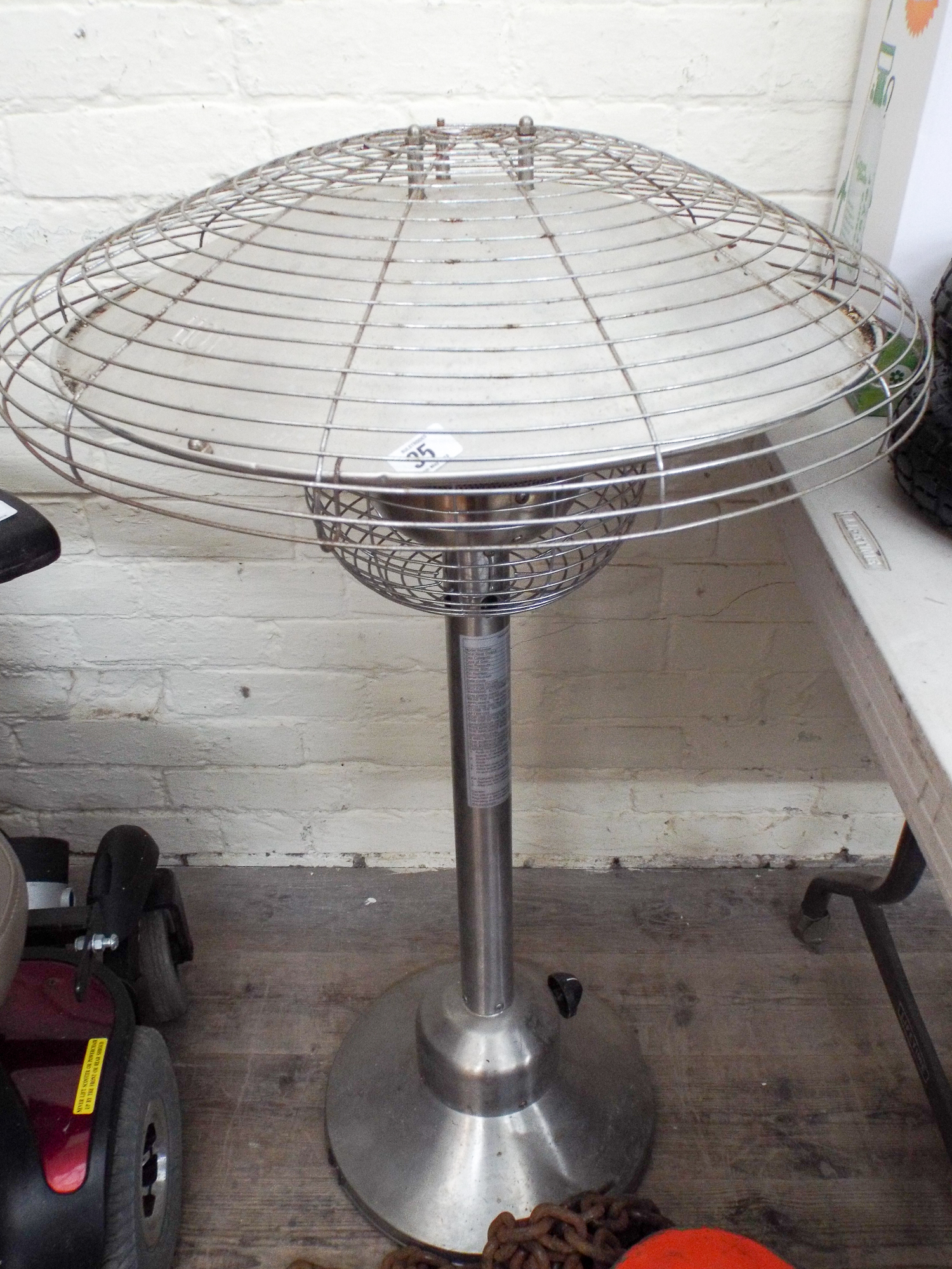 A stainless steel finish table top patio heater