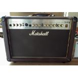 A Marshall acoustic AS50R soloist amplifier in brown case