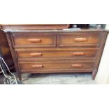 A mahogany finished chest of two long and two short drawers,