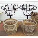 A pair of reconstituted stone circular garden planter,