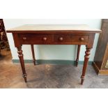 A Victorian mahogany hall table, fitted with two draws standing on turned legs,