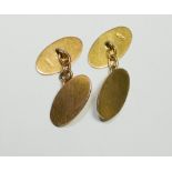 A pair of gents 9ct yellow gold cufflinks of oval form, 5.