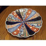 An Imari charger plate with lobed edge,