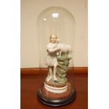 Victorian coloured bisque figurine of a shepherdess beneath a glass dome,