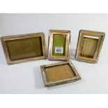 Four hallmarked silver rectangular easel photograph frames largest 15cms tall one