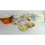 A collection of Poole Pottery to include a leaf shaped plate and an early Carter Stabler Adams dish