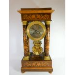 A Regency inlaid rosewood portico clock with brass bezel,