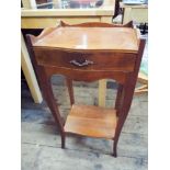 A French cherry wood finished two tier bedside table fitted drawer