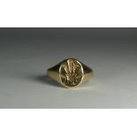 A gents 9ct yellow gold signet ring with intaglio panel, engraved with Prince of Wales feathers,
