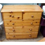 A modern pine chest of three long and two short drawers 2'6 wide