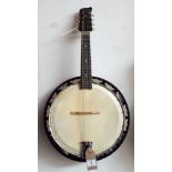 An eight string Banjo Mandolin made by George Houghton & Sons of Birmingham with a carrying case